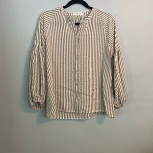 Mustard seed, grey and white top.